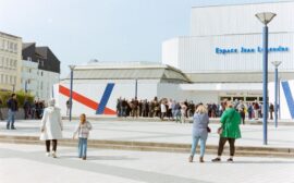 Crowd gathered at Espace Jean Legendre Theater in Compiegne, France.