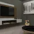 Stylish living room setup featuring a mounted TV, acoustic guitar, abstract art, and modern furniture design.