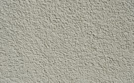 a close up of a wall made of cement