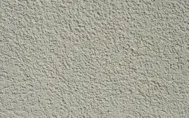 a close up of a wall made of cement