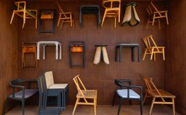 A room filled with lots of different types of chairs