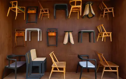 A room filled with lots of different types of chairs