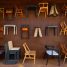 A room filled with lots of different types of chairs