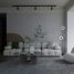 a living room with a couch, chair, table and speakers