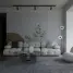 a living room with a couch, chair, table and speakers
