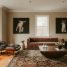 Living room with modern furniture and animal art
