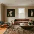 Living room with modern furniture and animal art