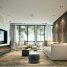 Modern living room with large windows and comfortable seating