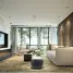 Modern living room with large windows and comfortable seating