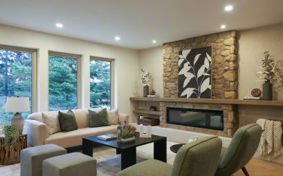 Cozy living room with stone fireplace and modern furniture