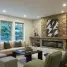 Cozy living room with stone fireplace and modern furniture